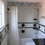 bathroom remodel white and black diamond tiles